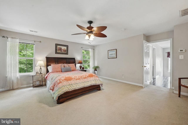 5280 Gunston Hall Dr, Woodbridge, VA 22193 - bedroom featuring baseboards, light colored carpet, and ceiling fan