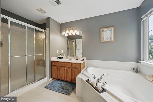 5280 Gunston Hall Dr, Woodbridge, VA 22193 - bathroom with a shower stall, vanity, a bath, and tile patterned flooring