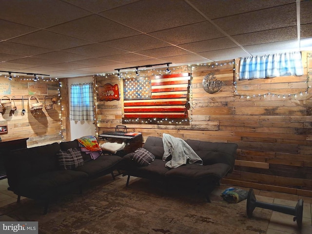 234 Bethel Grange Rd, Winchester, VA 22603 - living room featuring wooden walls, rail lighting, and a paneled ceiling