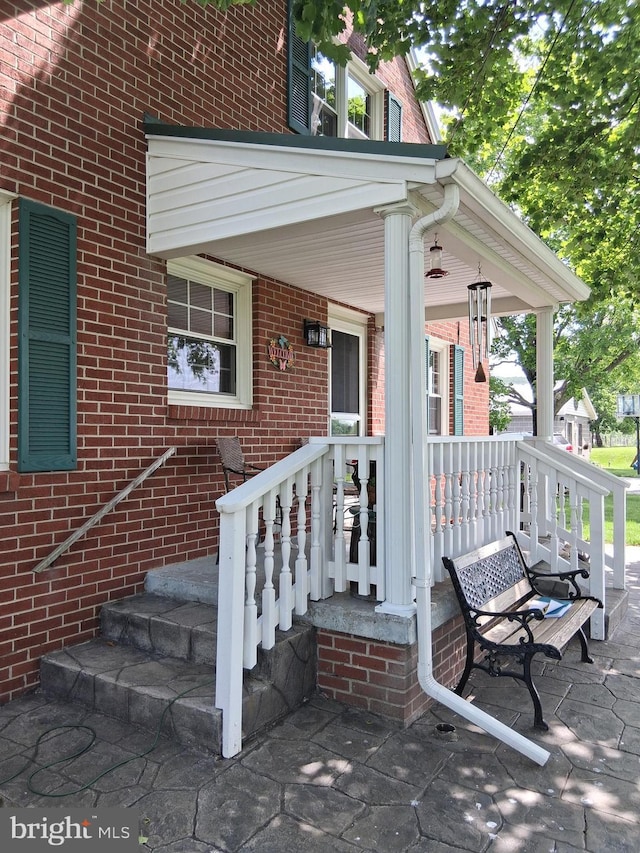 234 Bethel Grange Rd, Winchester, VA 22603 - entrance to property with a porch and brick siding