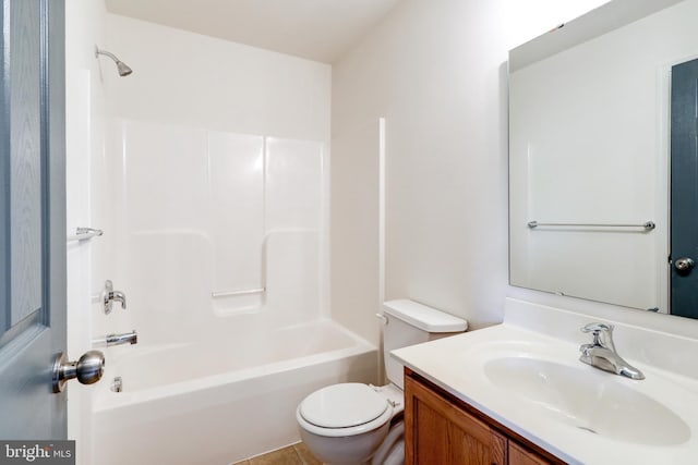 full bathroom with toilet, vanity, and  shower combination