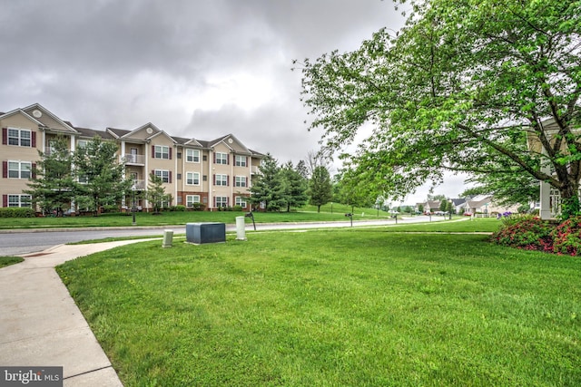 surrounding community with a lawn
