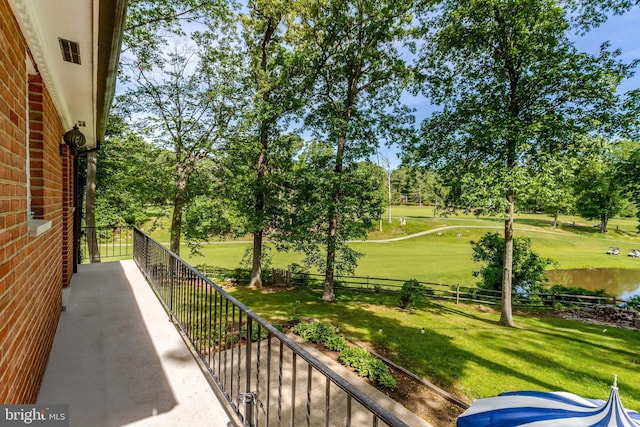 104 River Forest Ln, Fort Washington, MD 20744 - view of patio / terrace featuring view of wooded area, a water view, and view of golf course
