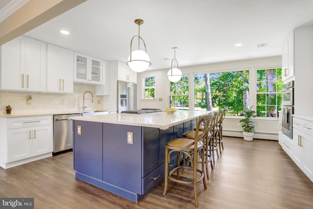 104 River Forest Ln, Fort Washington, MD 20744 - kitchen featuring stainless steel appliances, a baseboard radiator, white cabinetry, and recessed lighting