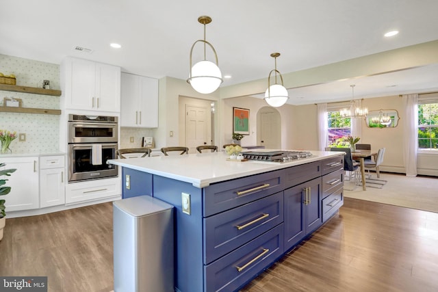 104 River Forest Ln, Fort Washington, MD 20744 - kitchen featuring appliances with stainless steel finishes, white cabinetry, wood finished floors, and recessed lighting