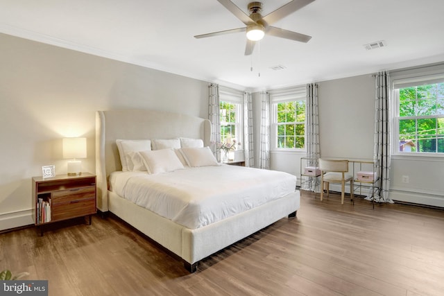 104 River Forest Ln, Fort Washington, MD 20744 - bedroom featuring wood finished floors and ornamental molding