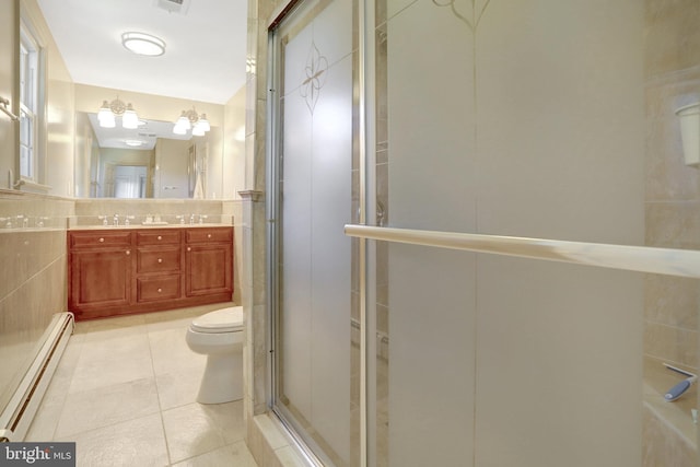 104 River Forest Ln, Fort Washington, MD 20744 - full bathroom with a baseboard radiator, tile patterned floors, a shower stall, double vanity, and toilet