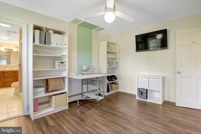 104 River Forest Ln, Fort Washington, MD 20744 - home office with wood finished floors, a ceiling fan, baseboards, and a sink