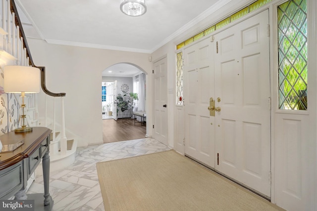 104 River Forest Ln, Fort Washington, MD 20744 - entryway featuring arched walkways, stairs, crown molding, and marble finish floors