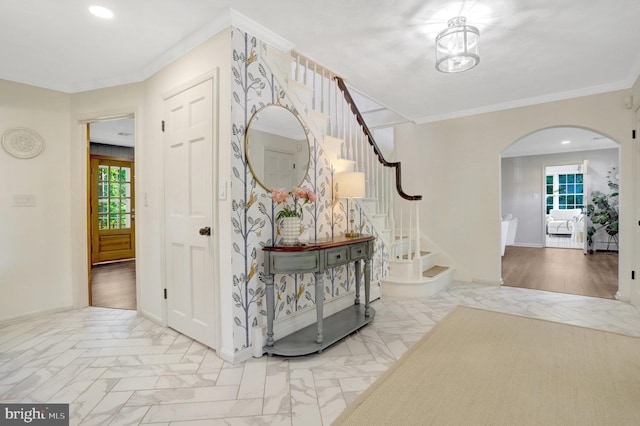 104 River Forest Ln, Fort Washington, MD 20744 - hallway with arched walkways, plenty of natural light, stairs, crown molding, and recessed lighting