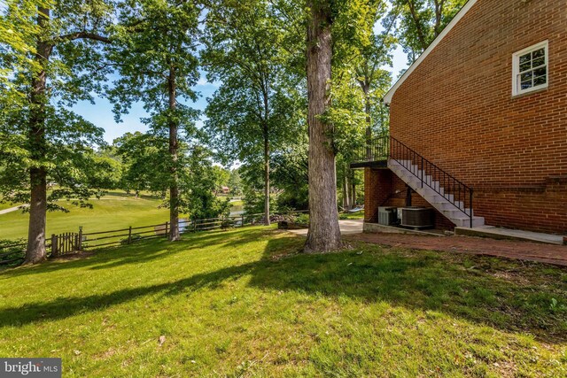 104 River Forest Ln, Fort Washington, MD 20744 - view of yard with stairs and central air condition unit