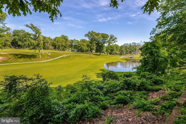 104 River Forest Ln, Fort Washington, MD 20744 - view of home's community featuring a water view, golf course view, view of wooded area, and a lawn