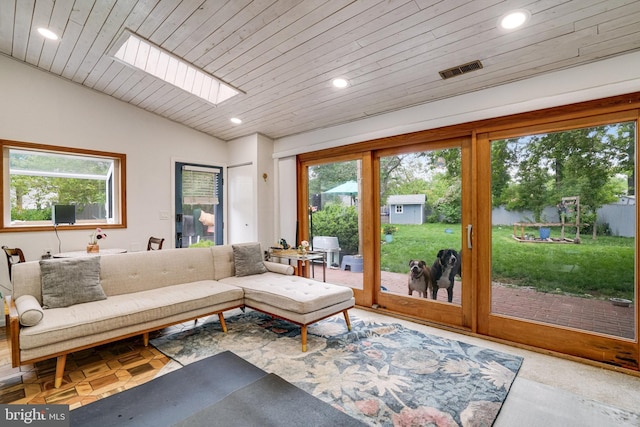 8102 Wingfield Pl, Alexandria, VA 22308 - living room with vaulted ceiling, recessed lighting, a skylight, and wooden ceiling