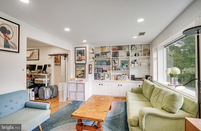 8102 Wingfield Pl, Alexandria, VA 22308 - living area with light wood-type flooring and recessed lighting