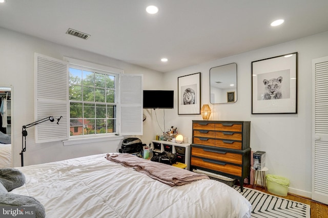 8102 Wingfield Pl, Alexandria, VA 22308 - bedroom with recessed lighting, wood finished floors, and baseboards