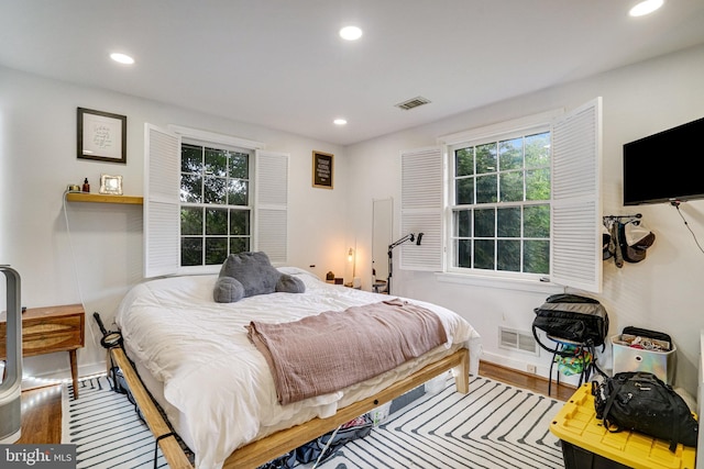 8102 Wingfield Pl, Alexandria, VA 22308 - bedroom featuring recessed lighting, wood finished floors, and baseboards