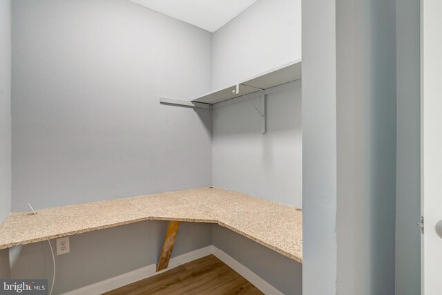 2836 Beechtree Ln, Woodbridge, VA 22191 - walk in closet with wood finished floors