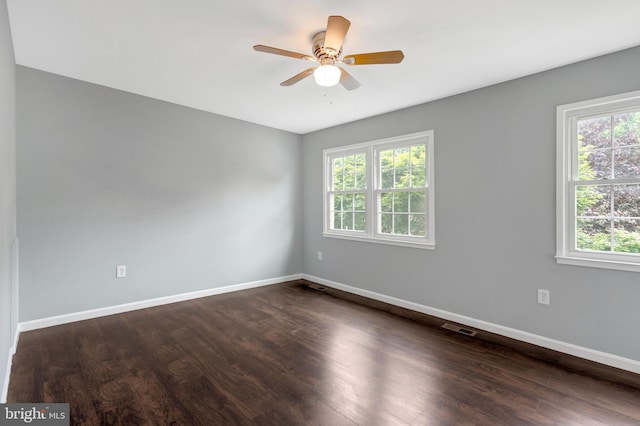 2836 Beechtree Ln, Woodbridge, VA 22191 - unfurnished room with dark wood-style floors, ceiling fan, and baseboards