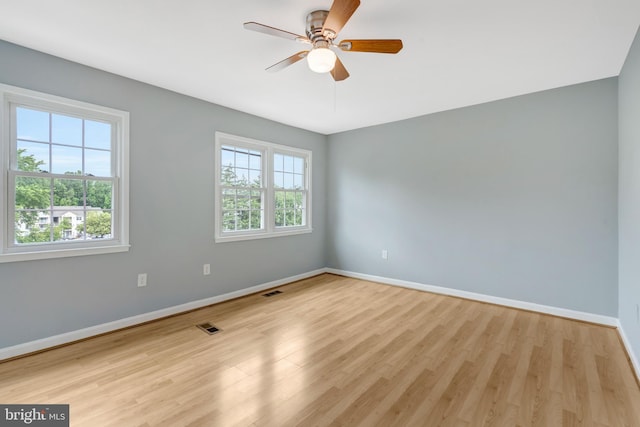 2836 Beechtree Ln, Woodbridge, VA 22191 - unfurnished room featuring baseboards, wood finished floors, and a ceiling fan