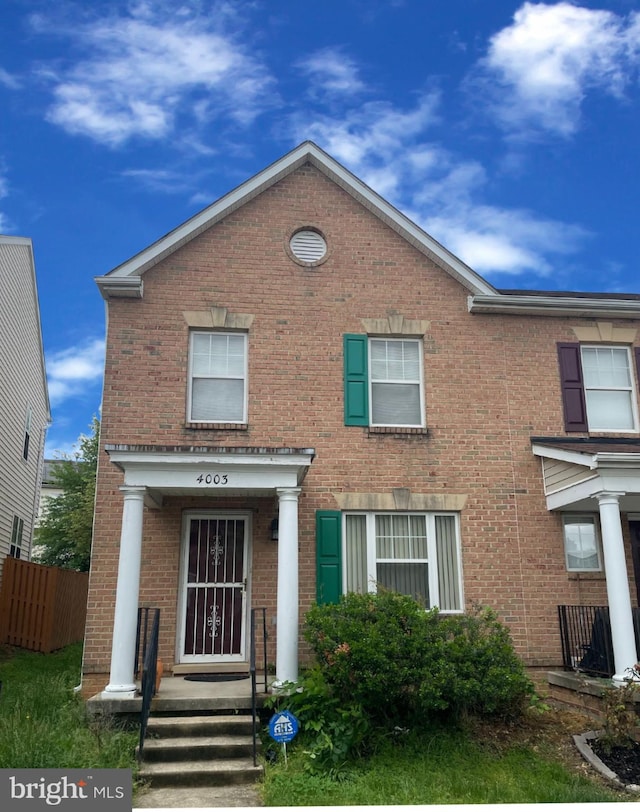 4003 Blakney Ln SE, Washington, DC 20032 - view of property featuring brick siding and fence