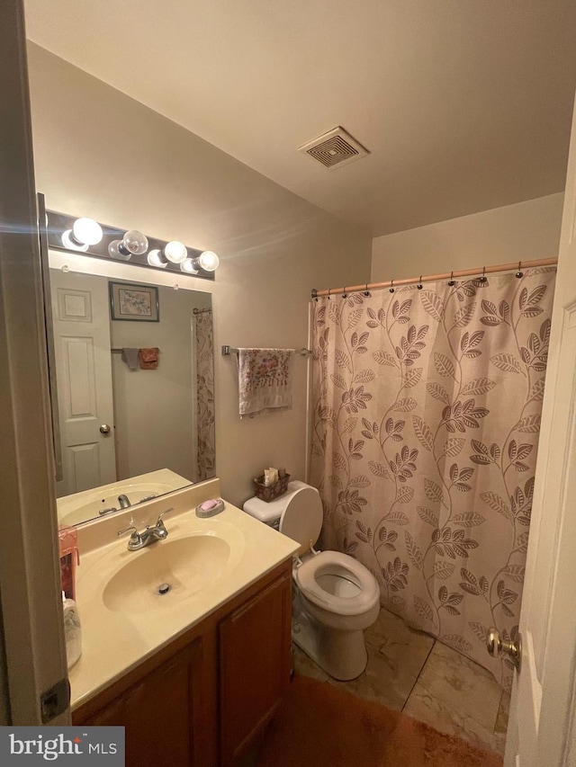 4003 Blakney Ln SE, Washington, DC 20032 - bathroom with vanity, toilet, marble finish flooring, and curtained shower
