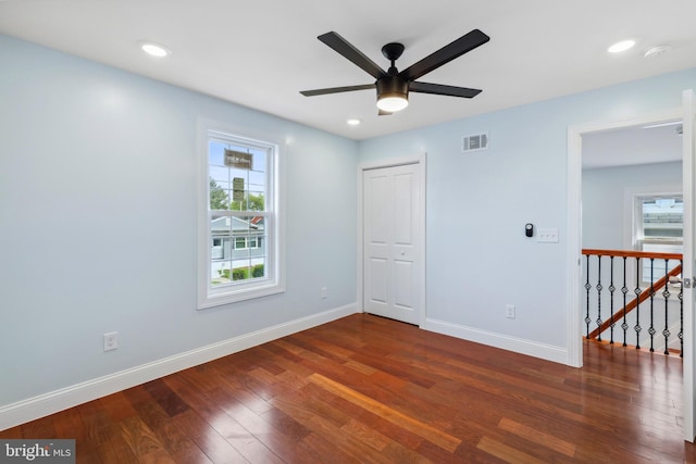 7608 Avondale Ave, Baltimore, MD 21224 - spare room featuring dark wood finished floors, baseboards, a ceiling fan, a smoke detector, and recessed lighting