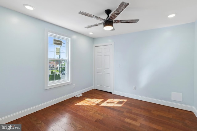 7608 Avondale Ave, Baltimore, MD 21224 - unfurnished room with baseboards, dark wood-style floors, ceiling fan, and recessed lighting