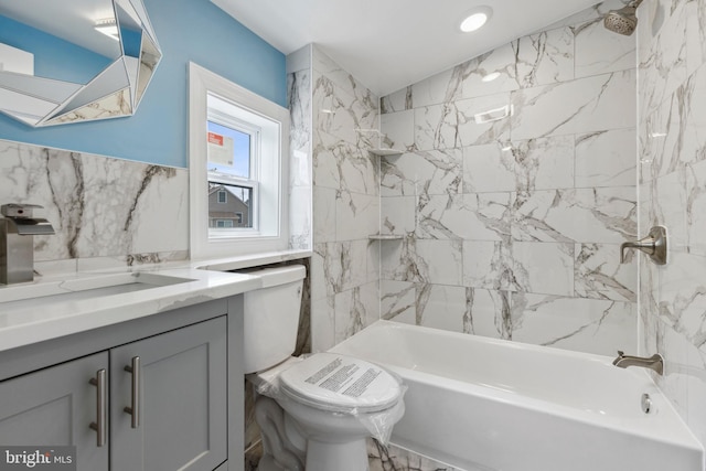 7608 Avondale Ave, Baltimore, MD 21224 - bathroom featuring toilet, vanity, and shower / washtub combination