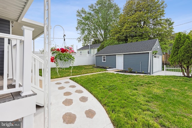 7608 Avondale Ave, Baltimore, MD 21224 - view of yard featuring an outdoor structure and a garage