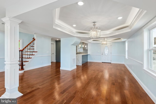 7608 Avondale Ave, Baltimore, MD 21224 - unfurnished living room with a raised ceiling, a chandelier, recessed lighting, dark wood-style floors, and crown molding