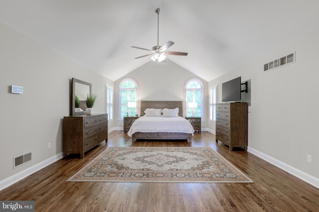 bedroom with wood finished floors, baseboards, lofted ceiling, and ceiling fan
