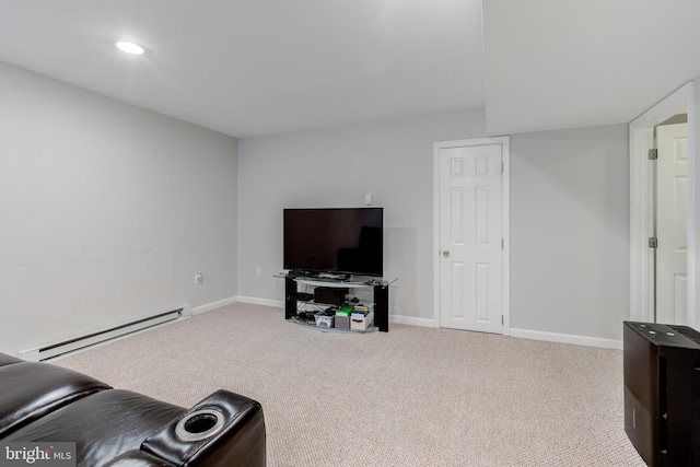 living room featuring baseboard heating, carpet floors, baseboards, and recessed lighting