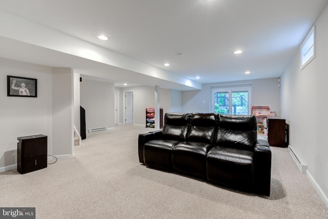 living area with a baseboard radiator, carpet flooring, stairs, and recessed lighting