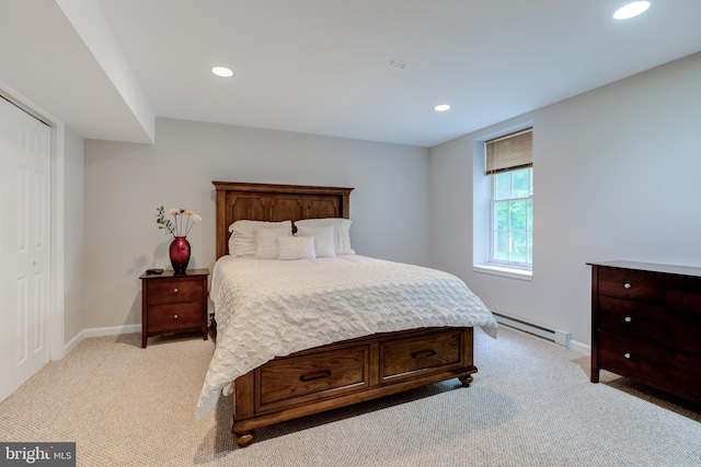 bedroom with baseboard heating, light carpet, recessed lighting, and baseboards