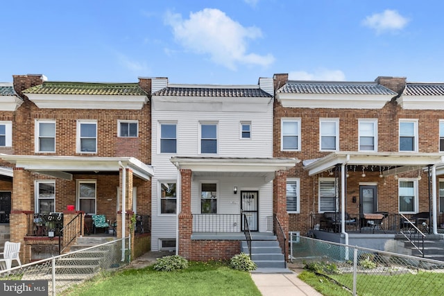 3827 Boarman Ave, Baltimore, MD 21215 - multi unit property with covered porch and brick siding