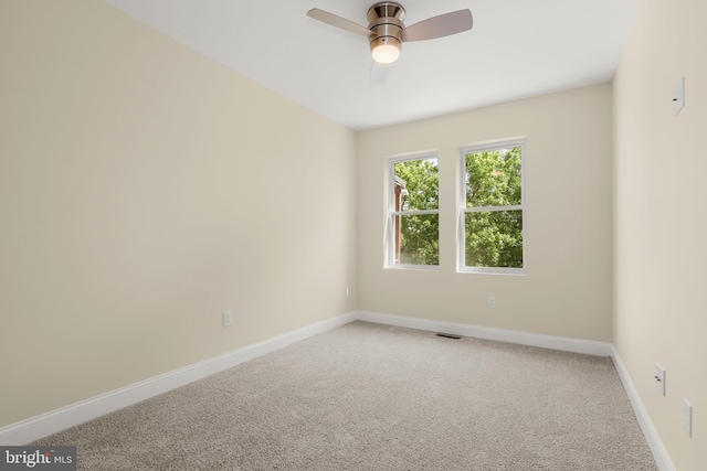 3827 Boarman Ave, Baltimore, MD 21215 - empty room featuring light carpet, baseboards, and a ceiling fan