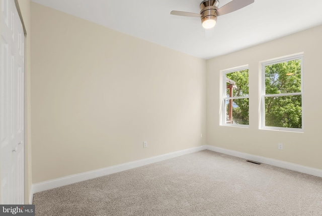 3827 Boarman Ave, Baltimore, MD 21215 - empty room featuring carpet, baseboards, and ceiling fan