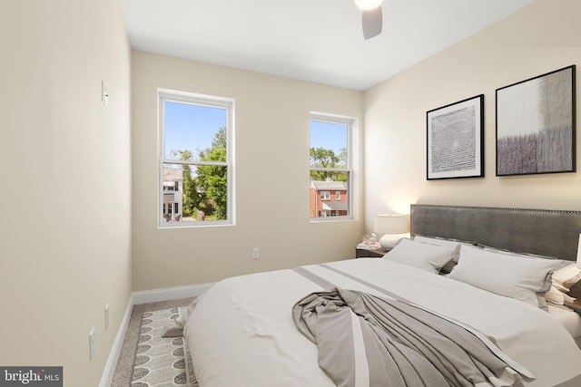 3827 Boarman Ave, Baltimore, MD 21215 - carpeted bedroom with baseboards and ceiling fan