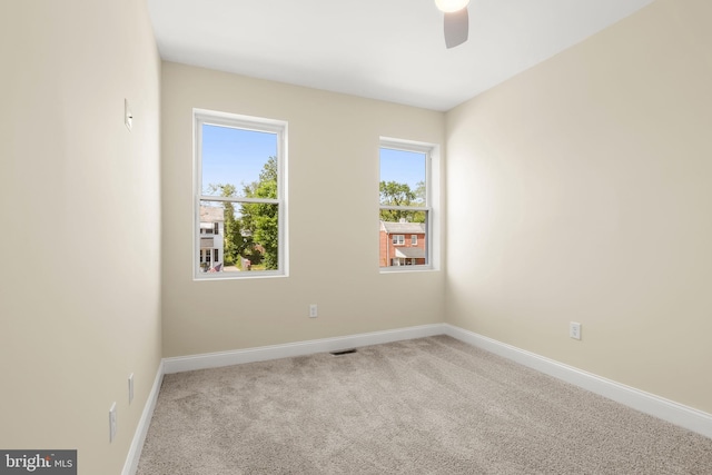 3827 Boarman Ave, Baltimore, MD 21215 - spare room with a ceiling fan, baseboards, and carpet flooring