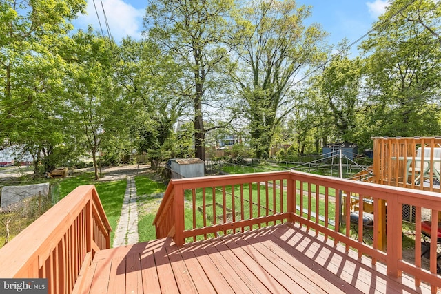 3827 Boarman Ave, Baltimore, MD 21215 - wooden deck featuring a storage unit and an outdoor structure