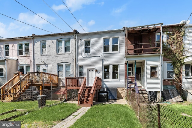 3827 Boarman Ave, Baltimore, MD 21215 - rear view of house with a wooden deck, central AC, and stairs