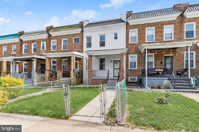 3827 Boarman Ave, Baltimore, MD 21215 - view of property with a porch, a gate, and brick siding