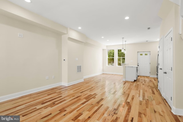 3827 Boarman Ave, Baltimore, MD 21215 - unfurnished living room featuring light wood finished floors, recessed lighting, and baseboards