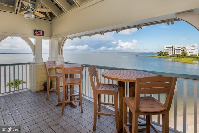6 Fountain Dr E Unit 2B, Ocean City, MD 21842 - balcony with a ceiling fan and a water view