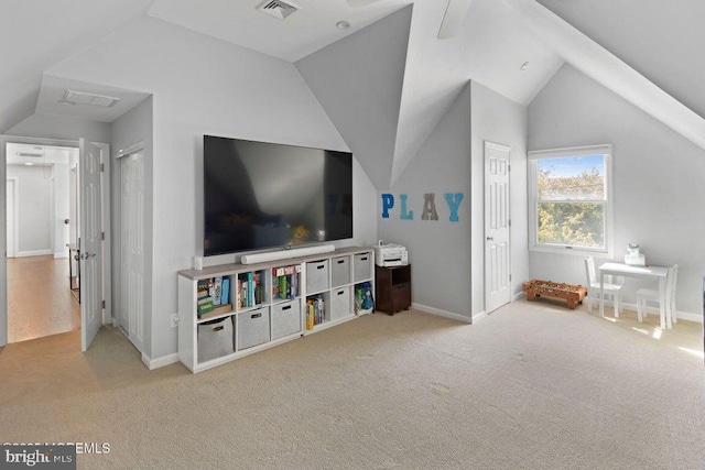 game room with vaulted ceiling, carpet floors, and baseboards