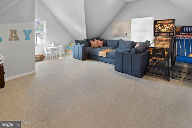 carpeted living room with lofted ceiling and baseboards