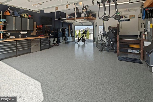 garage with a workshop area
