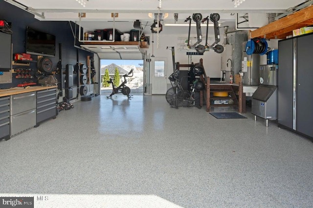 garage with a workshop area