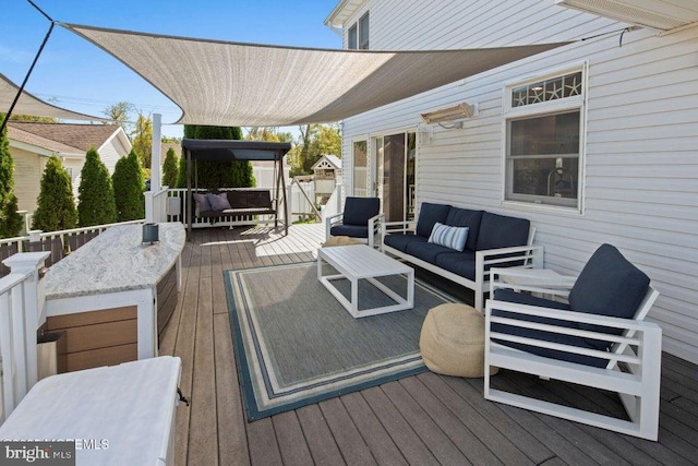 deck with an outdoor hangout area