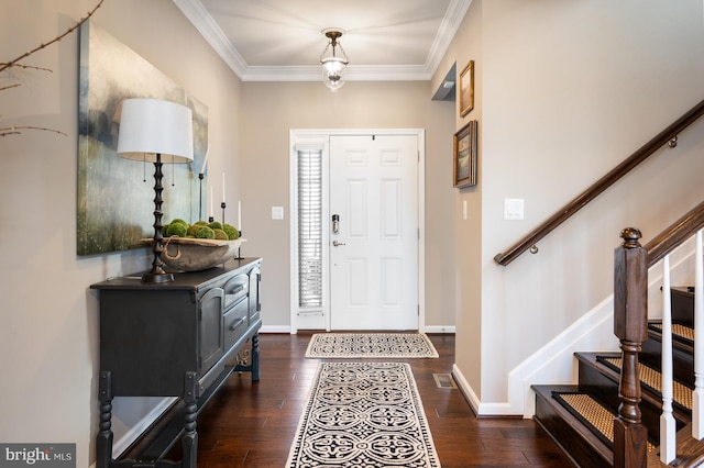 entryway featuring stairs, wood finished floors, crown molding, and baseboards